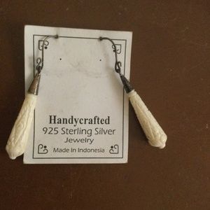 Handcrafted carved white dangle earrings on 925 silver.